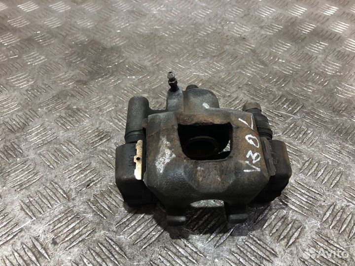 Суппорт тормозной задний левый Toyota Camry V30