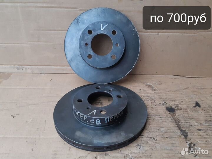 Диск тормозной передний Митцубиси Ланцер CB 92-00