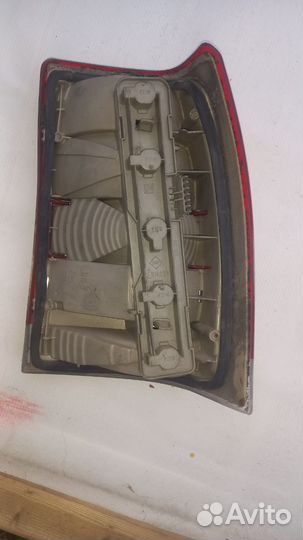 Фонарь левый Опель Омега А универсал