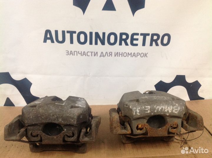 Суппорт тормозной задний BMW. E39