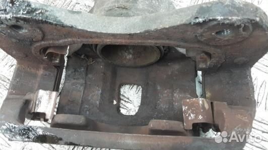 Суппорт тормозной передний левый KIA sportage 2 (A