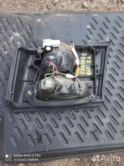 Фонарь крышки багажника левый Toyota Carina E