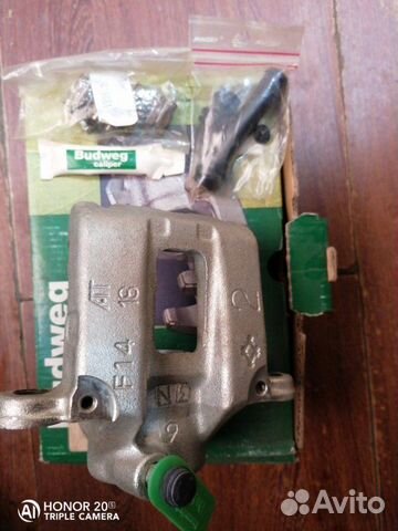 Суппорт задний левый Toyota Land Cruiser 80