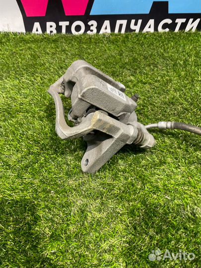 Суппорт тормозной задний левый Buick Encore GX