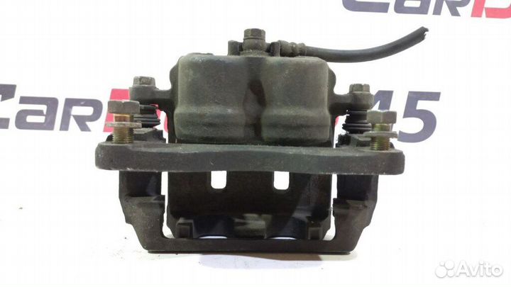 Суппорт передний левый б/у для Subaru Legacy (2629