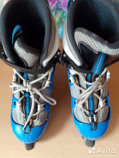 Роликовые коньки