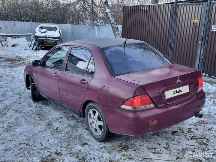 Mitsubishi Lancer 1.6 МТ, 2004, 150 000 км