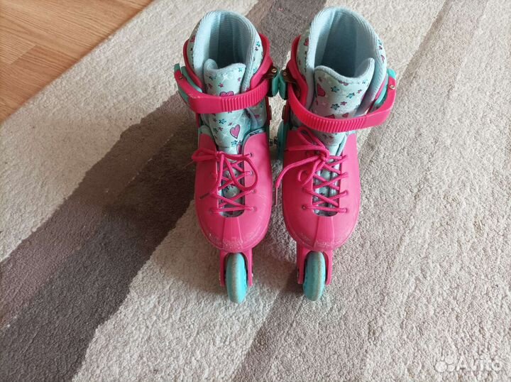 Роликовые коньки