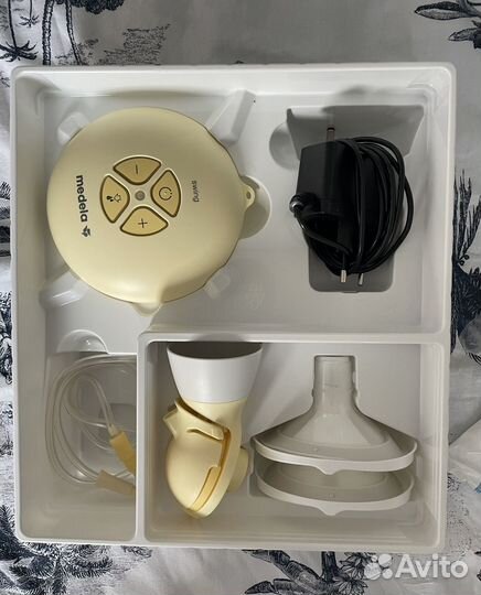 Молокоотсос medela swing электрический