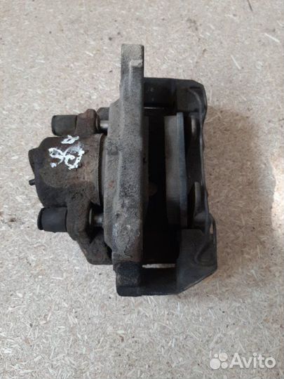 Суппорт тормозной передний правый Volkswagen