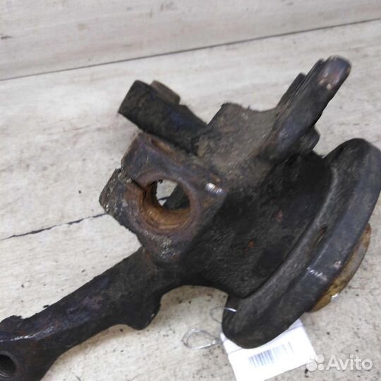 Кулак поворотный передний левый Volkswagen Passat