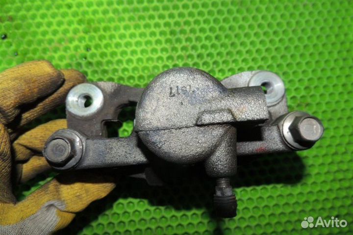 Суппорт тормозной задний правый Mitsubishi Lancer