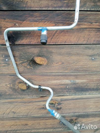 Трубка кондиционера Рено Логан/Ларгус