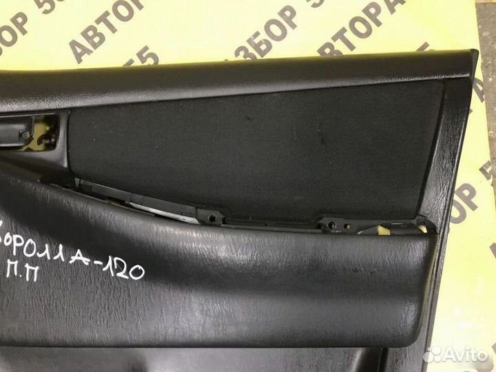 Обшивка двери передней правой Toyota Corolla E12