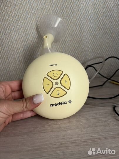 Молокоотсос medela электрический