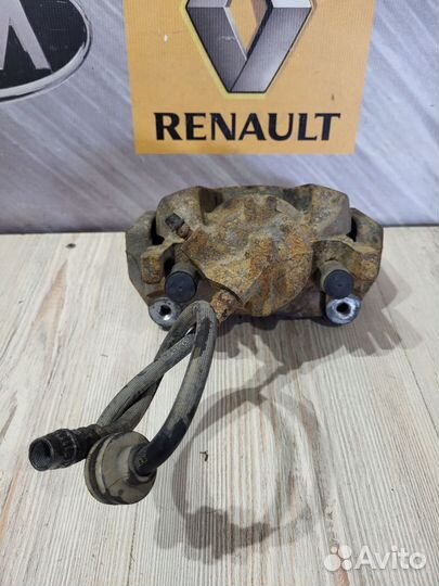 Суппорт тормозной перед Renault scenic 3 Лев