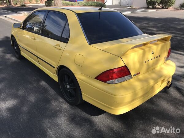 Стекло заднее Mitsubishi Lancer 9 Cedia CS CS6