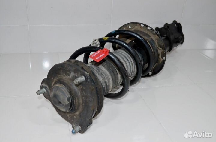 Стойка амортизатора передняя правая Kia Sportage 4