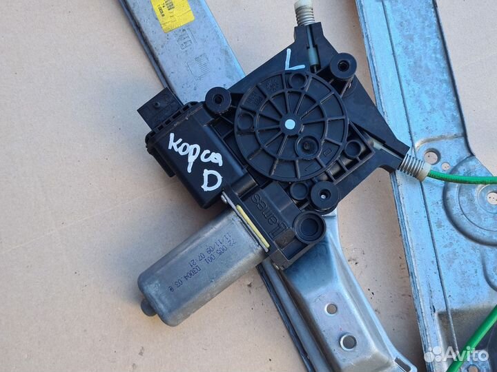 Опель Корса д передний левый стеклоподьемник