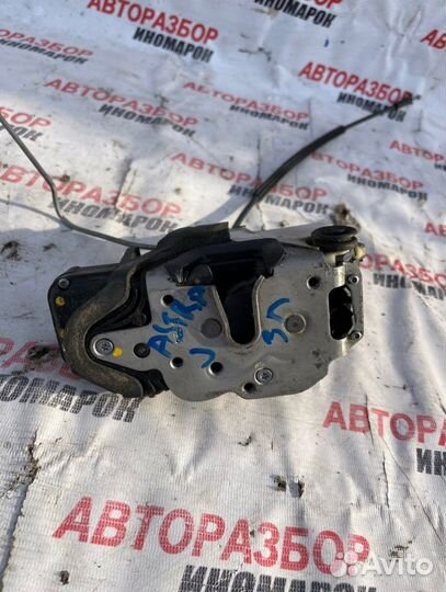 Замок двери задний левый Opel Astra J