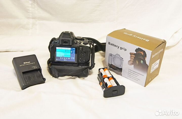 Nikon D5100 (body) с батарейной ручкой