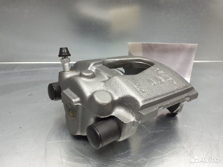 Суппорт тормозной передний левый Chevrolet Lanos