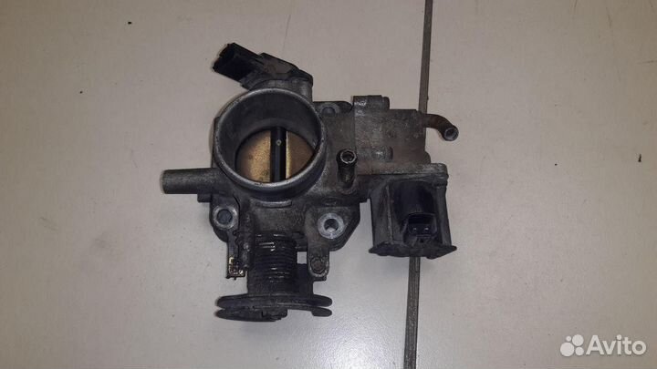 Заслонка дроссельная Mazda 323