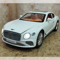 Bentley Continental белая с оранжевым салоном