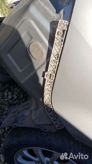 Кронштейн заднего бампера на Mitsubishi Lancer 10