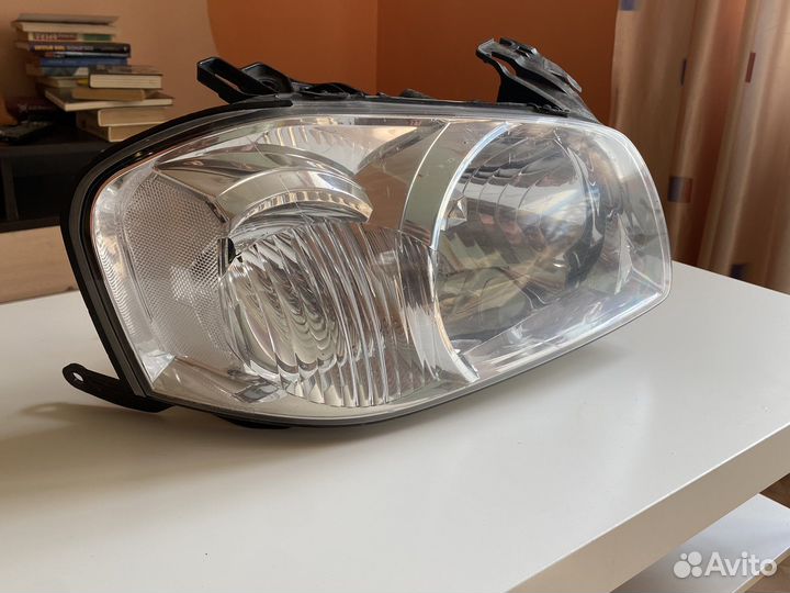 Фара Mazda Tribute I Рестайлинг