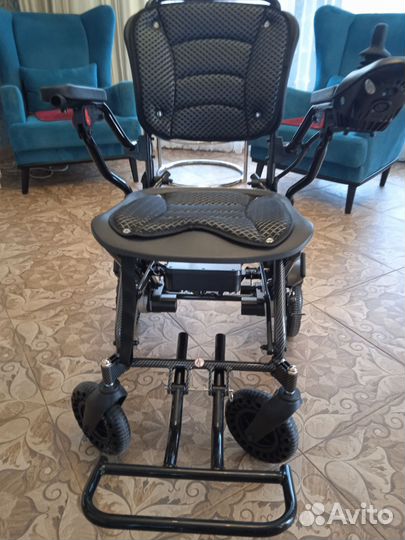 Инвалидная коляска с электроприводом