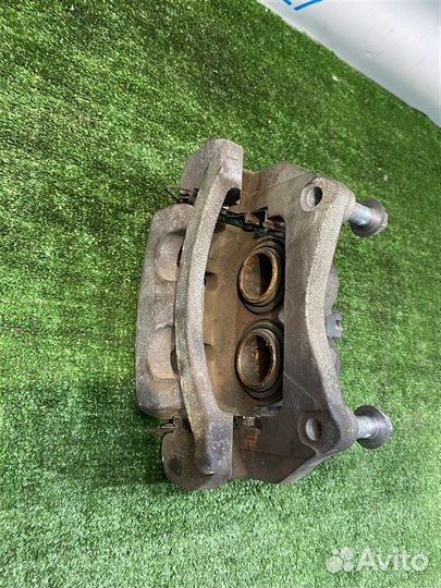 Суппорт тормозной(2) передний левый Nissan X-Trail