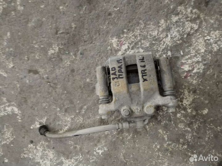 Суппорт задний на nissan x-trail