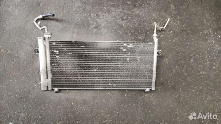 Радиатор кондиционера на nissan march AK11