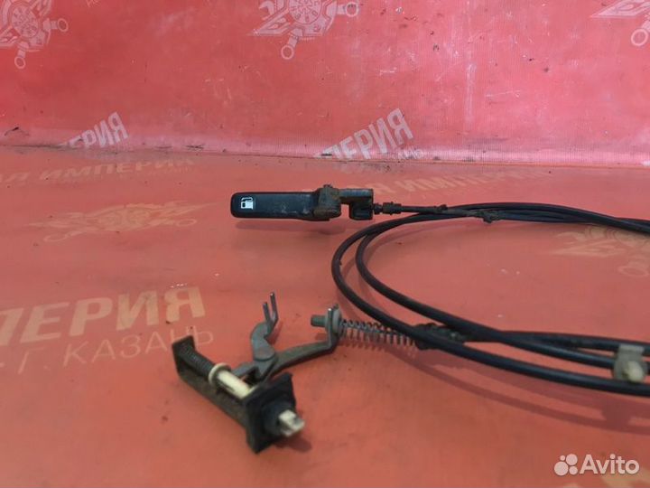 Трос лючка бака Nissan Almera N16 седан QG18DE