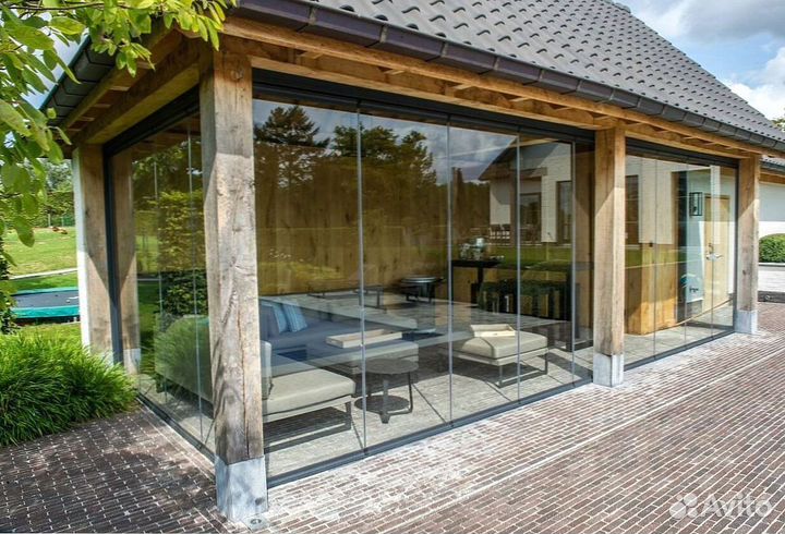 Безрамное раздвижное остекление