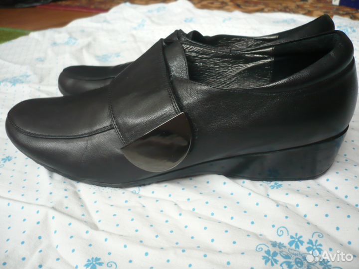 Новые кожаные туфли