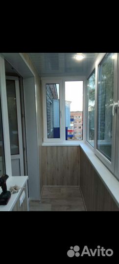 Обшивка балкона под ключ