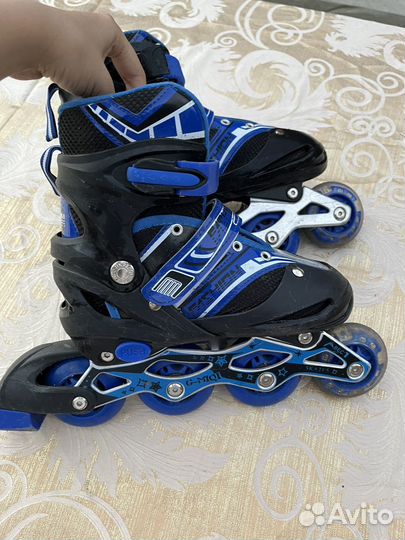 Роликовые коньки