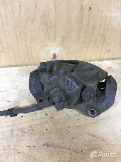 Суппорт передний левый Opel Astra H