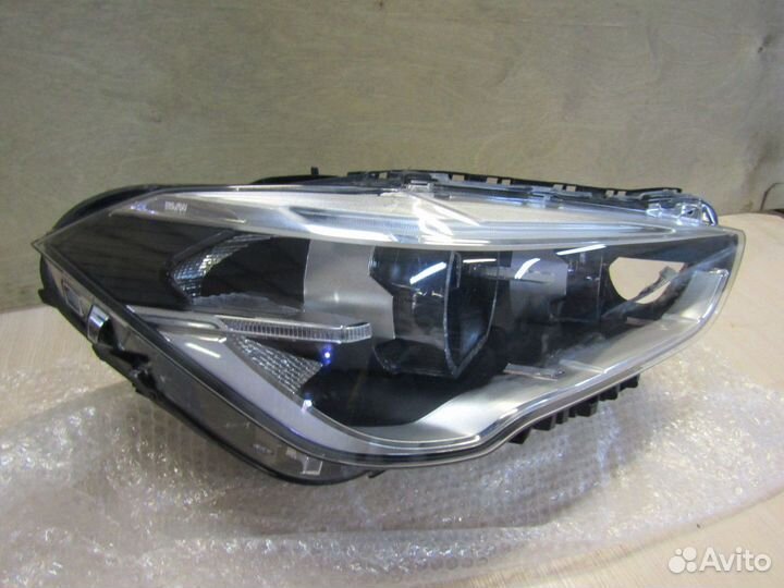 Фара правая BMW X1
