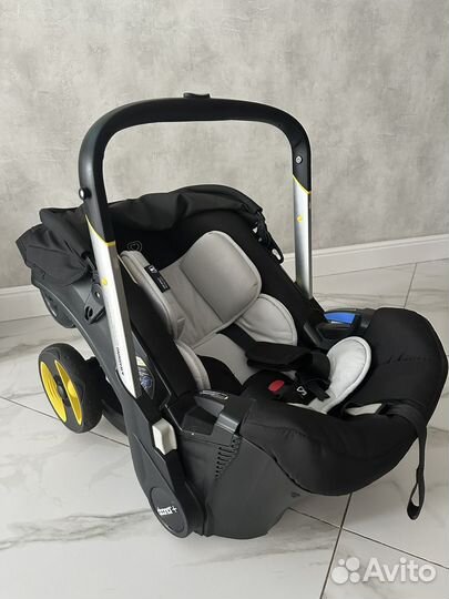 Коляска автокресло doona с базой isofix