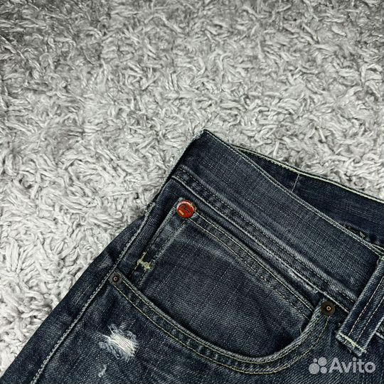 Джинсы Evisu