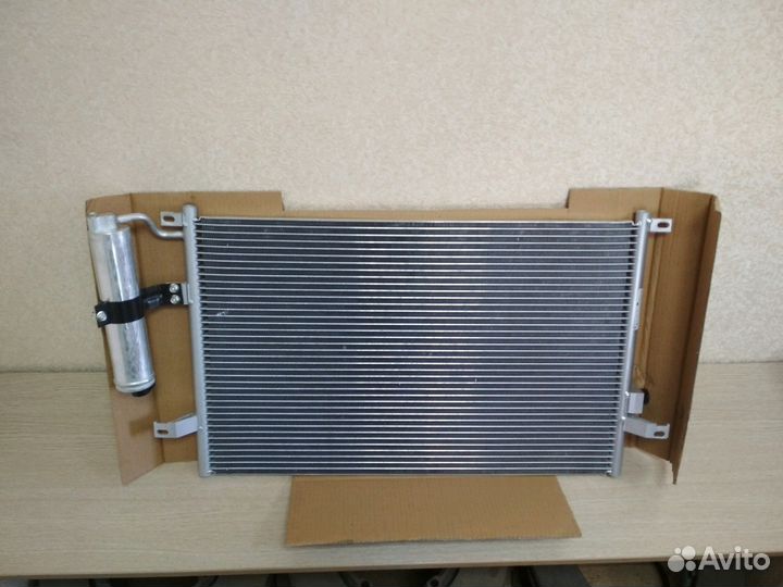Радиатор кондиционера Chevrolet Lacetti