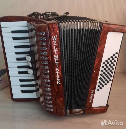 Аккордеон weltmeister 1/2