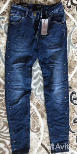 Джинсы новые