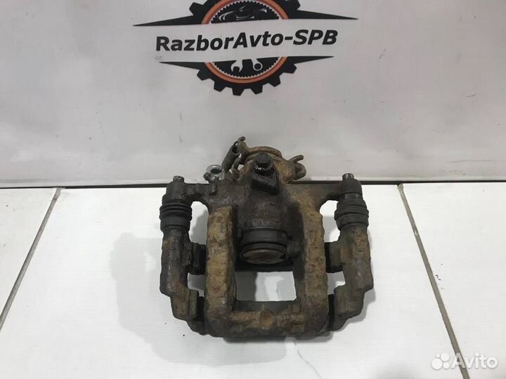 Суппорт задний левый Chevrolet Cruze