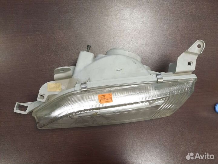 Фара левая Toyota Carina 96-01 арт 811702B680