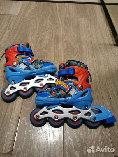 Роликовые коньки