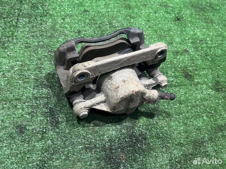 Суппорт тормозной передний левый Рено Меган K4M